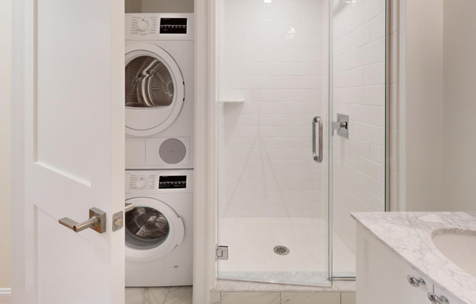 Regency Plaza Apartments in Providence Rhode Island - Bathroom with Washer Dryer